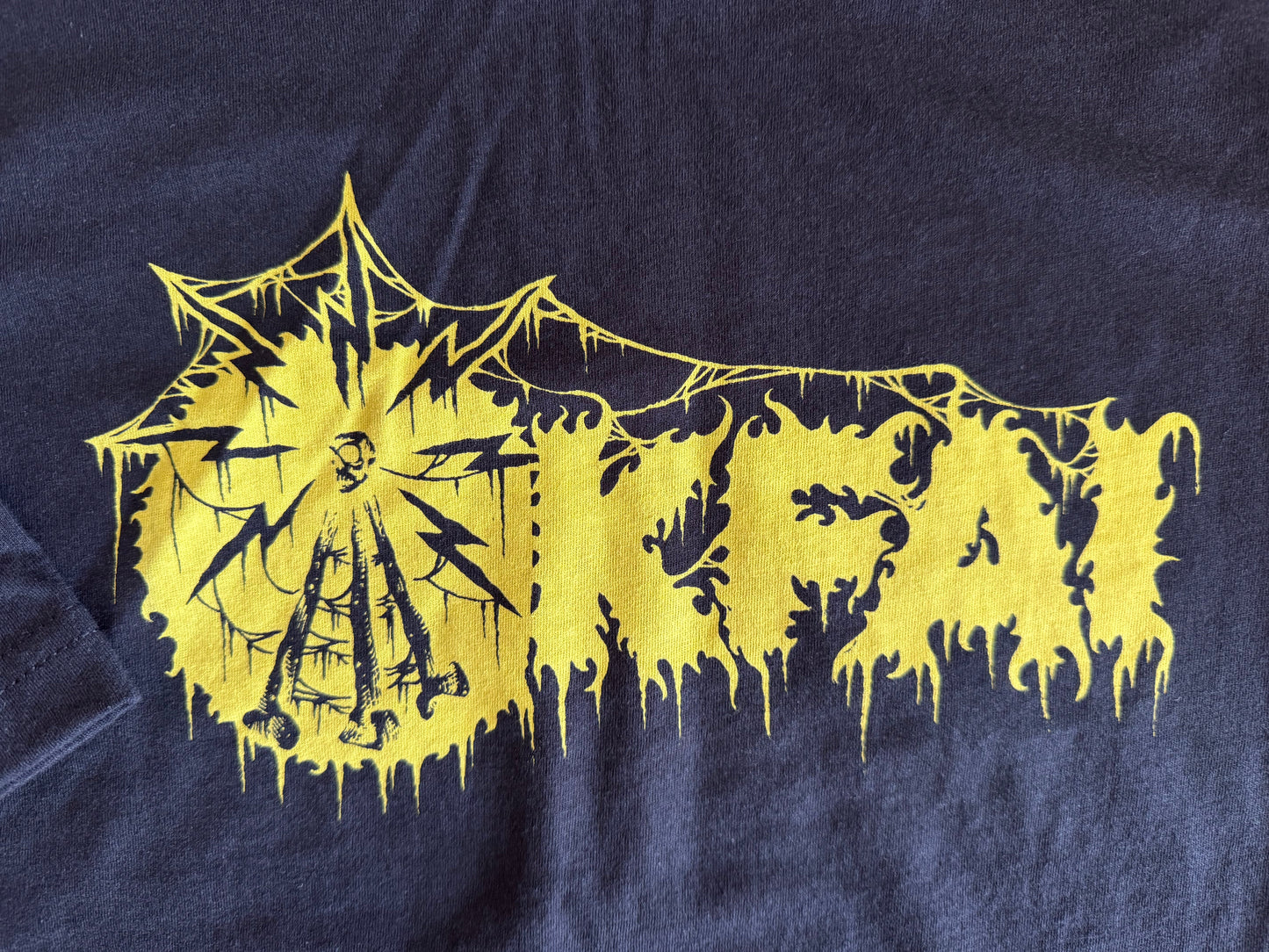 Black shirt with yellow print