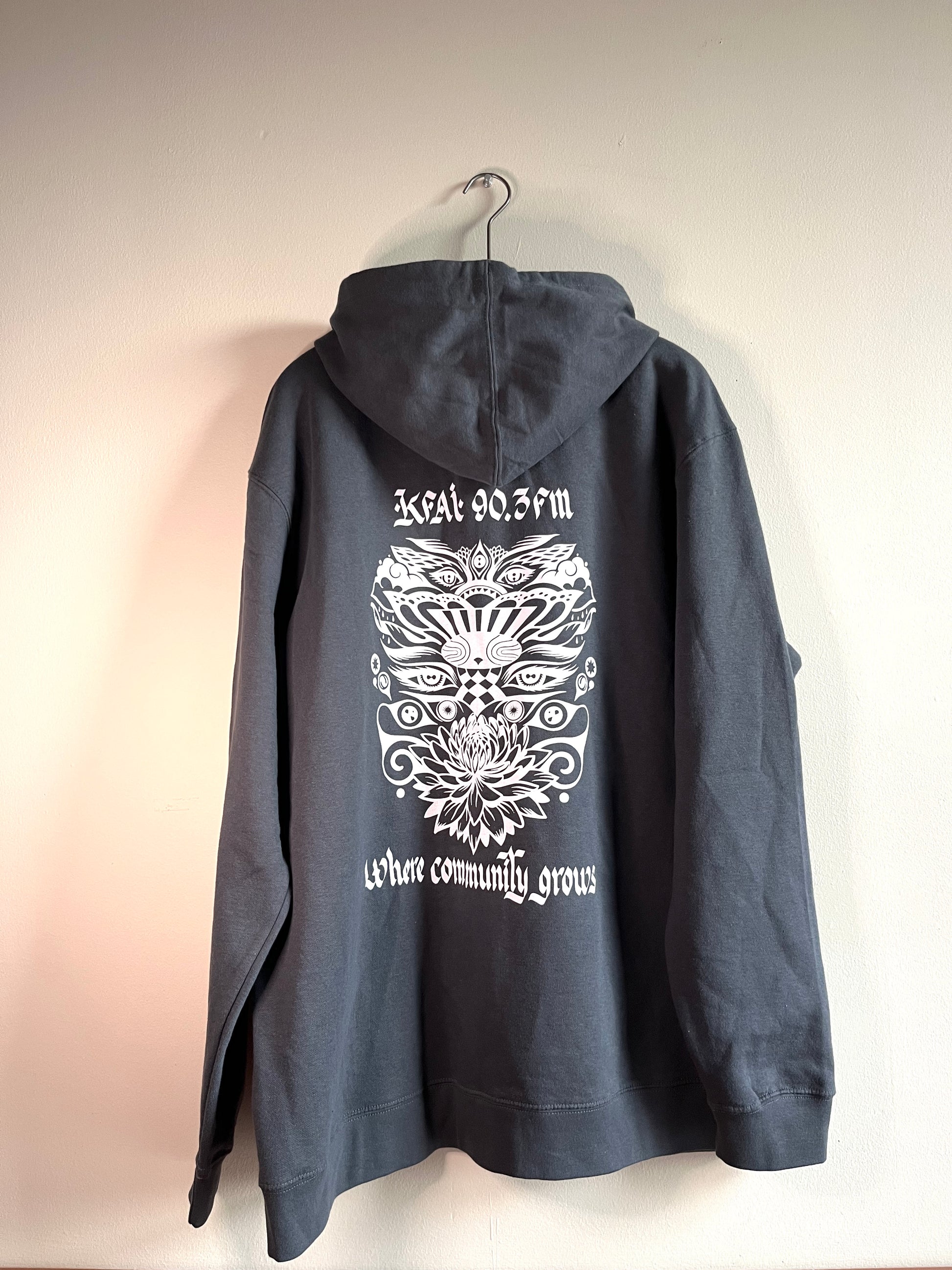 Back of hoodie with the same design as the Andres Guzman t-shirts. White ink, image on back.